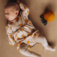 Bodykleid aus Bio Baumwolle mit Orangenmuster